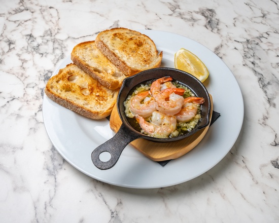 Sizzling garlic prawns with toasted sourdough