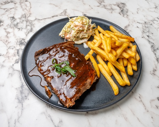 Bourbon-glazed pork ribs with fries and slaw